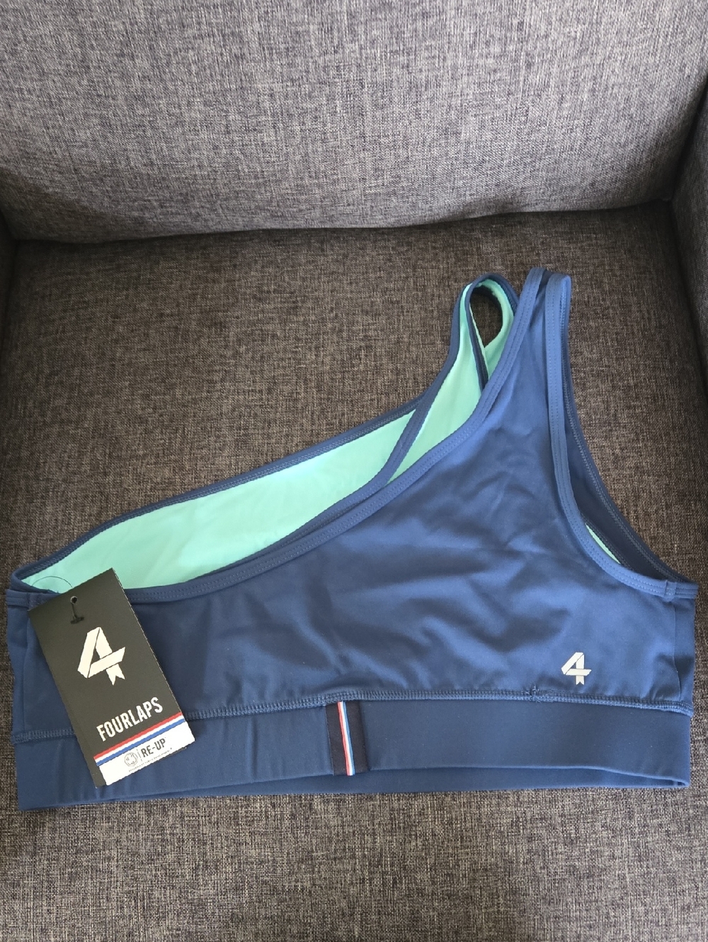 Fourlaps One-Shoulder Sports Bra in Navy with Mint Lining